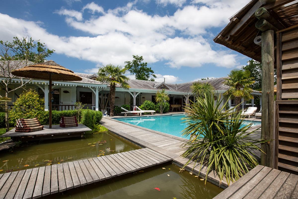 Magnifique villa contemporaine au coeur d’un jardin tropical à Lacanau - 4093673PVDEC